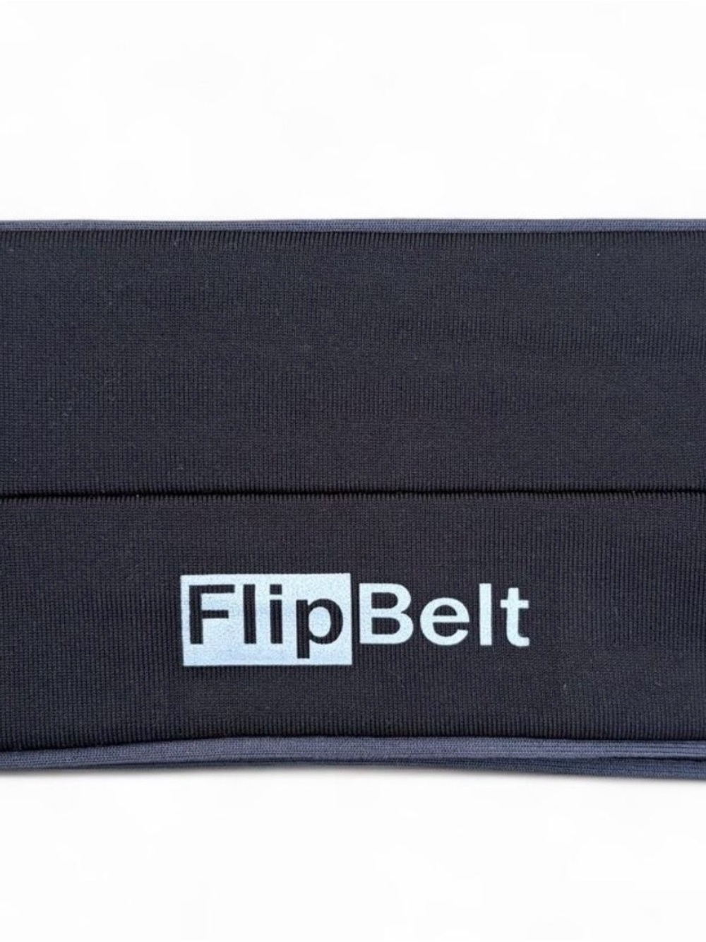 Black FlipBelt fitness belt in an XL Unisex size (measures 17” flat across)